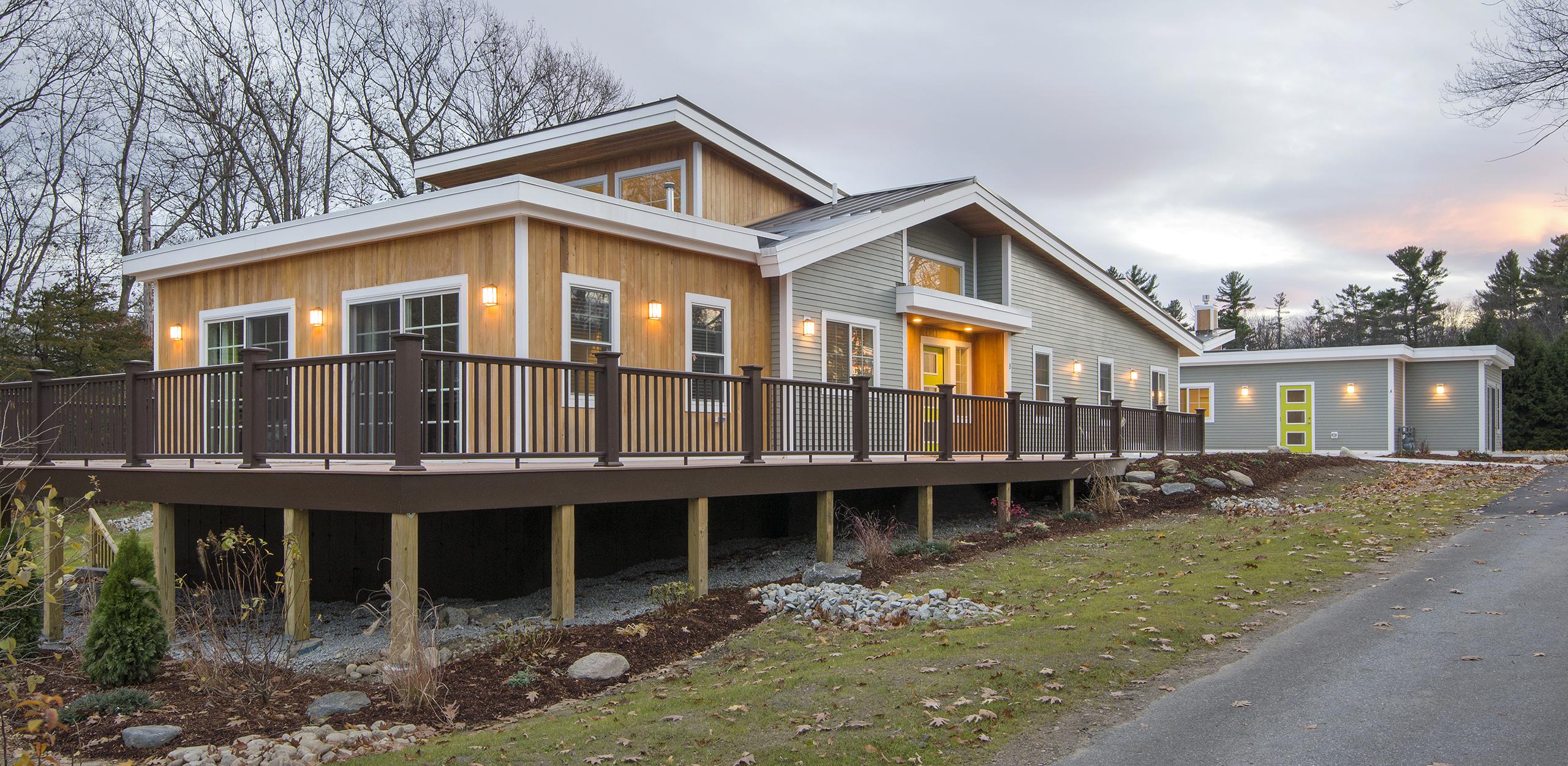 New construction of a sustainable 2-building, 9-unit group home in Carlisle, MA.