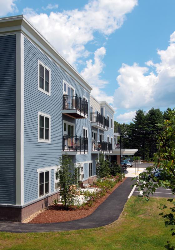 Rear exterior view with unit patios and balconies